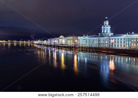 View Of Universitetskaya Embankment At Night In Saint Petersburg, Russia