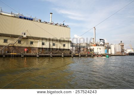 Zaanse Schans, Netherlands, August 19, 2015 - Industrial Area With Containers, Pipes, Tubes And Cran