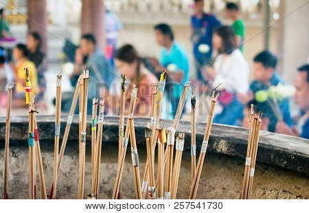 Nakhon Pathom, Thailand - August 25: Visitors Pray And Burn Incense At Wat Rai Khing, A Popular Budd