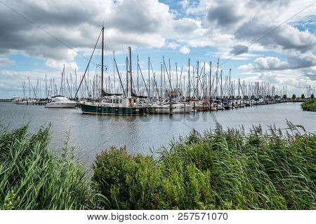 Yatchs Moored In The Marina Of Volendam
