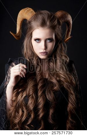 Portrait Of An Attractive Demon Woman With Horns