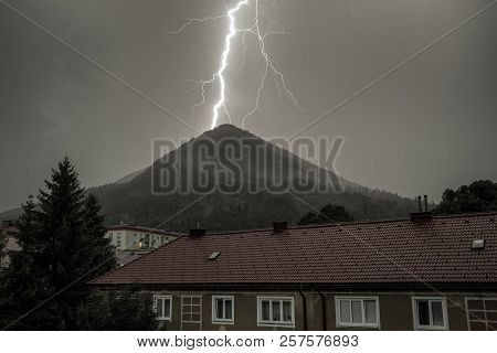 Thuderstorm. Lightning And Dark Clouds. Colorful Sky