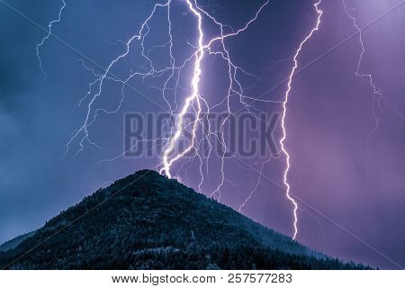 Thuderstorm. Lightning And Dark Clouds. Colorful Sky