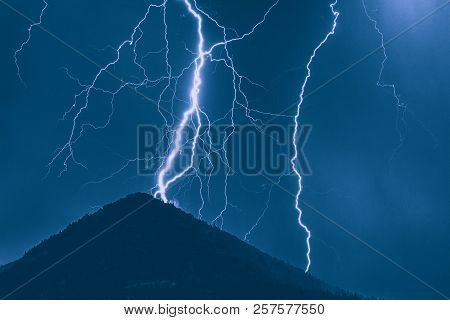 Thuderstorm. Lightning And Dark Clouds. Colorful Sky