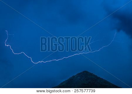 Thuderstorm. Lightning And Dark Clouds On The Sky