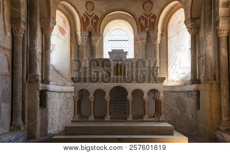 Gourdon, France - August 3, 2018: Interior With Pink Color, Altar And Frescoes Of The Romanesque Chu