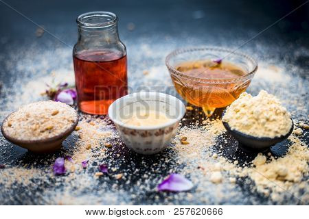 Close Up Of Oats Face Pack I.e. Rose Water,oats,gram Flour And Honey On Wooden Surface Used In Spa F