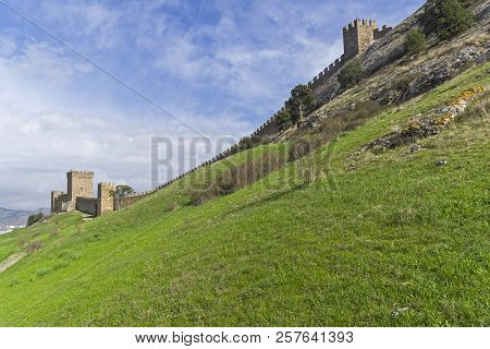 Genoese Fortress In Sudak, Crimea.the Citadel And The Wall Of The Upper Tier Of Defense. Early April