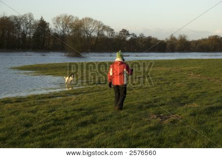 Lady Walking Dog