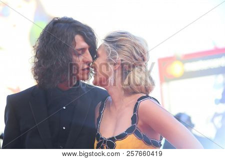 Francesco Motta and Carolina Crescentini walk the red carpet ahead of the Award Ceremony during the 75th Venice Film Festival at Sala Grande on September 8, 2018 in Venice, Italy.