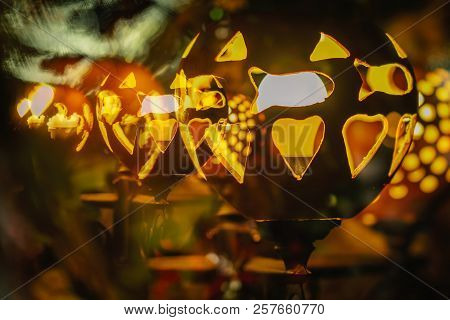 Abstract Bakground From Holidays City Illumination, Electric Street Lamp Decorated With Carved Pumpk