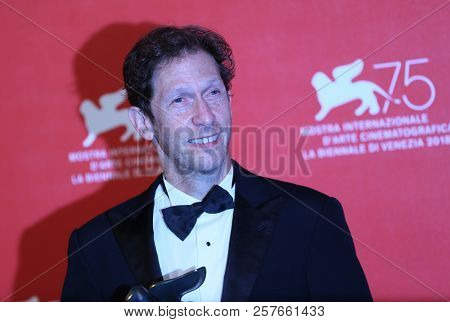Tim Blake Nelson poses with the Best Screenplay Award for 'The Ballad Of Buster Scruggs ' at the Winners Photocall during the 75th Venice Film Festival on September 8, 2018 in Venice, Italy. 