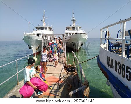 Dzharylgach Island - Ukraine - August 2018: Tourist Entering Coast From Ship, Named Om 104 For Few H