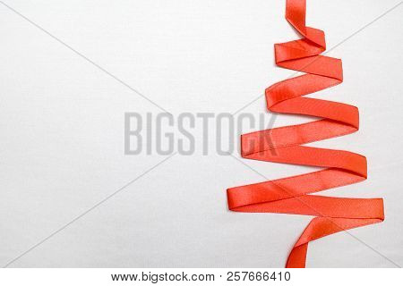 Christmas And New Year Tree Made From Red Ribbon On Silverbackground Free Space For Text - Holidays,