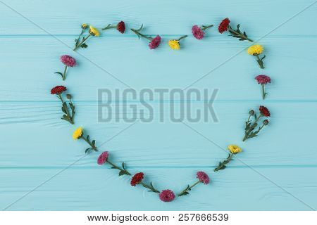 Heart Shaped Dahlia Flowers Composition On Wood. Top View, Flat Lay.