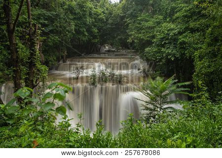 Huai Mae Khamin Waterfall In The Rainy Season With Turbid Water