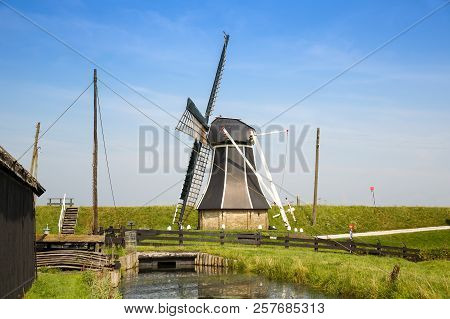 The Windmill In The Traditional Old Fisherman Village Open-air Museum Of Zuiderzee (zuiderzeemuseum)