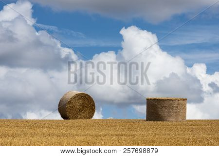 Straw Bales Composition On An Agricultural Grain Field In The Morvan, France.