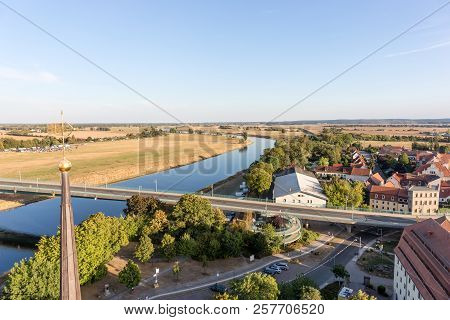 View Of The Bridge And River Elbe In Torgau, Saxony, Germany
