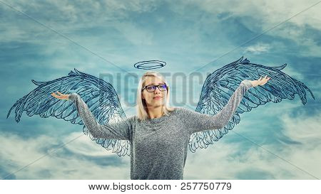 Proud Young Woman Raising Hands Up, Feel Powerful And Successful Imagine Herself An Angel With Wings