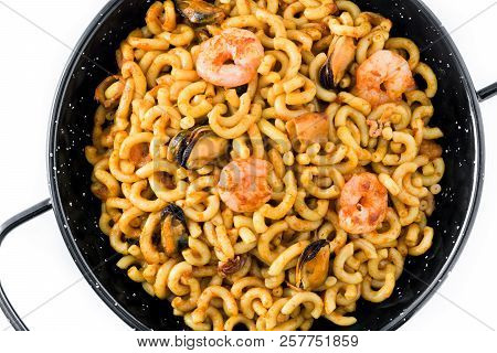 Traditional Spanish Fideua. Noodle Paella Isolated On White Background. Top View