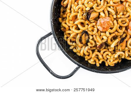Traditional Spanish Fideua. Noodle Paella Isolated On White Background. Top View