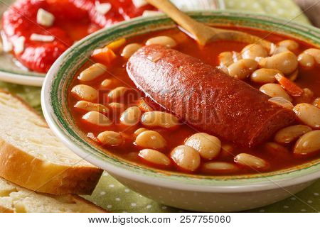 Traditional Balkan Food: Pasulj Bean Soup With Sausage Close-up On A Plate. Horizontal