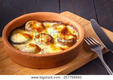 Georgian Cuisine: Close Up Mushrooms Baked With Cheese Suluguni On Ketsi