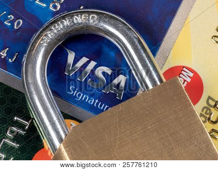 Morgantown, Wv - 11 September 2018: Macro Of Credit Cards With Brass Lock And Focus On Visa Symbol