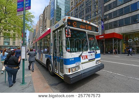 New York City - May 6, 2013: Mta Hybrid Electric Bus Route M2 On Fifth Avenue At 42nd Street, New Yo