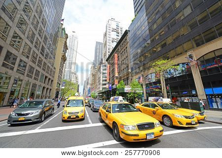 New York City - May 6, 2013: Yellow Cabs On Fifth Avenue At 39th Street, Manhattan, New York City, U