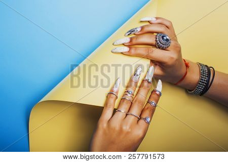 Woman Hands Holding Colorful Paper Copyspace Wearing A Lot Of Or