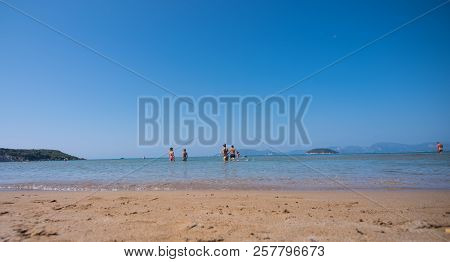 People Looking At The Sea In Greece On The Island Of Zakynthos.