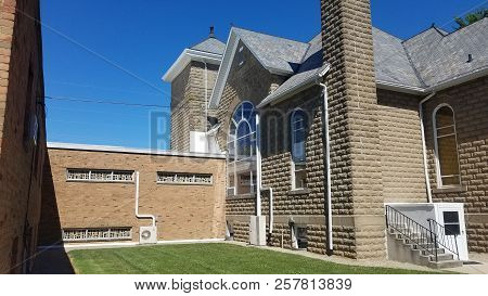 Grace Mennonite Church Back Exterior Facade Under A Clear Blue Sky, Pandora, Oh, July 5, 2018