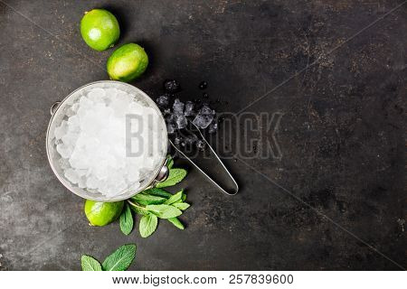Metal ice bucket and mojito ingredients