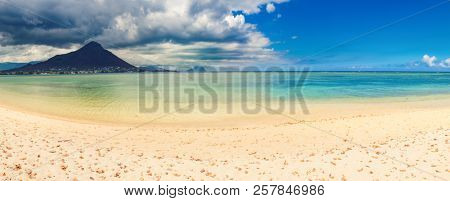 Sandy tropical Wolmar beach at sunny day. Beautiful landscape. Panorama. Mauritius