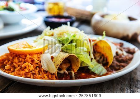 Enchilada with tomato rice, a mexican recipe