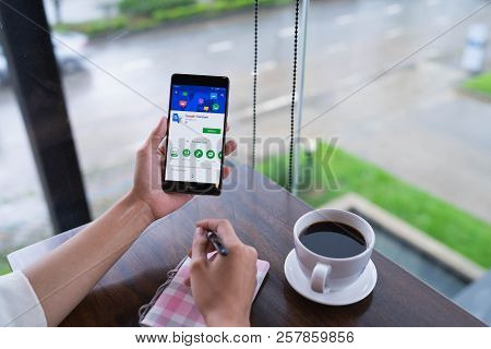 Chiang Mai, Thailand - August 18,2018: Woman Hands Holding Huawei With Google Translate On Screen.go