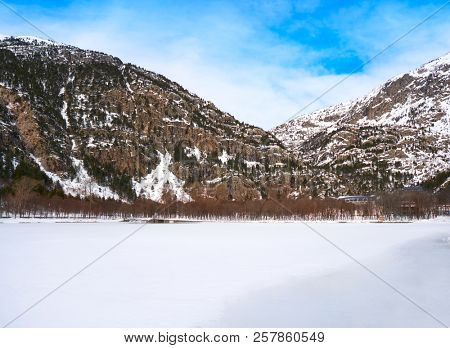 Panticosa snow frozen lake ice in Huesca Pyrenees of Spain