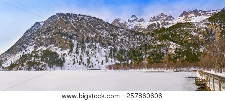 Panticosa snow frozen lake ice in Huesca Pyrenees of Spain