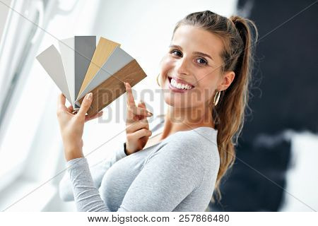 Mature woman doing home improvements