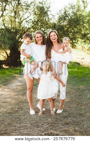 A Large Family With Homosexual Parents. Two Mothers.
