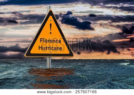 Hurricane Florence, Flood Concept. Road Sign In Water. 3d Rendering