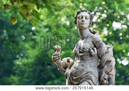 Sandstone Statues In The Saxon Garden, Warsaw, Poland. Made Before 1745 By Anonymous Warsaw Sculptor