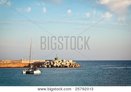 Sailboat Near The Harbour