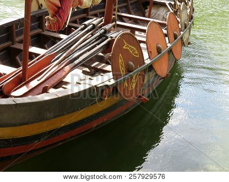 Viking Wooden Ship On The Water. Drakkar With The Shields On The Sides, Ancient Sailing Boat, Modern