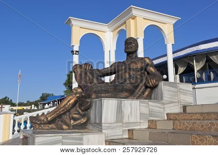 Evpatoria, Crimea, Russia - June 30, 2018: Sculpture A Resting Hercules On The Waterfront Of The Res
