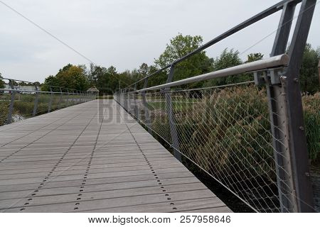 Wooden Bridge Over The River Tidan In Mariestad City Center