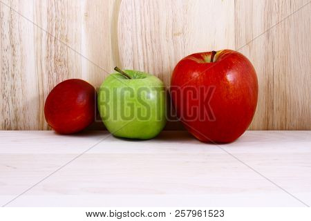 Beautifully Laid Out Fresh Summer Fruits On A Background Of Cutting Boards