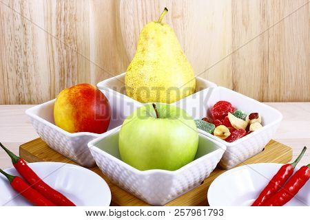 Beautifully Laid Out Fresh Summer Fruits On A Background Of Cutting Boards